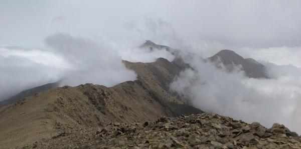 Photo of Looking along ridge from Adrar n'Ouhattar with mist forming