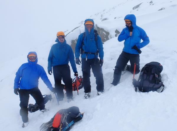 Photo of Rucksacks in hollows before getting crampons on