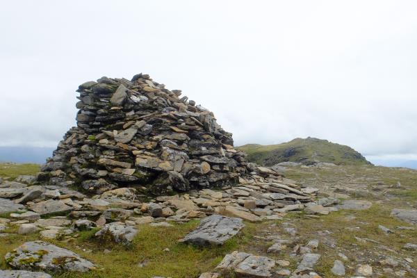 Photo of Large cairn with actual top of Beinn Dorain in background