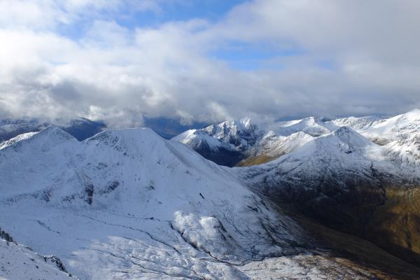Photo of Twin peaks of Na Gruagaichean on left leading to Stob Coire a' Chairn